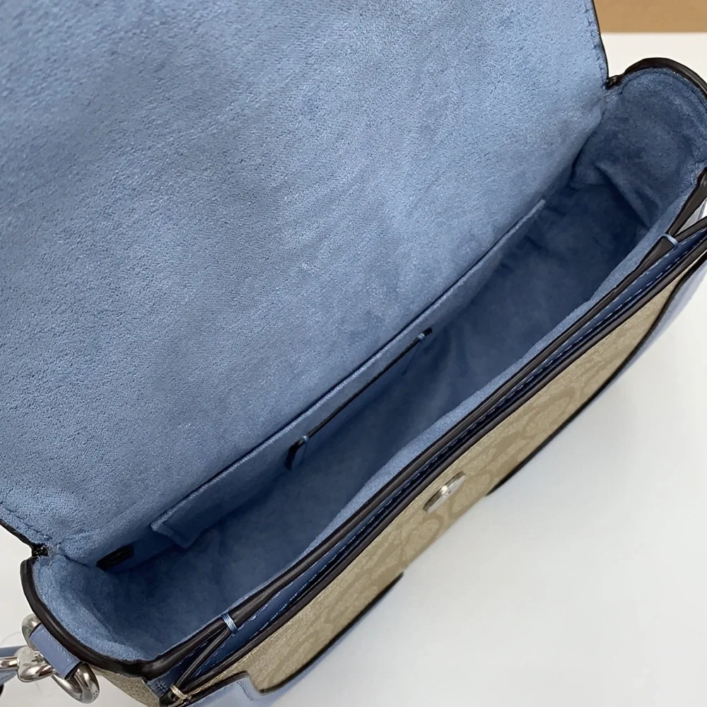 COACH Georgie Saddle Bag In Signat Canvas COLOR:
Silver/Light Khaki/Marble Blue - Picture 12 of 16